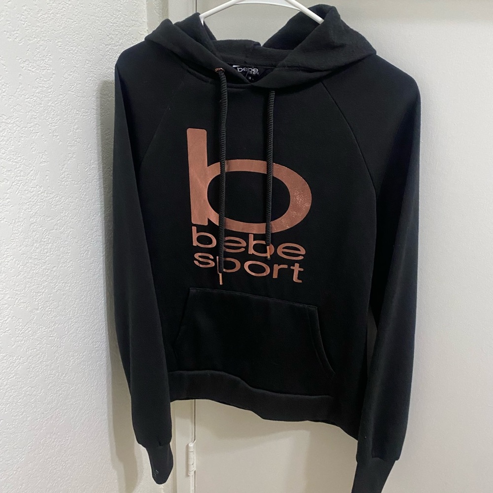 Bebe’s sports rose gold and black hoodie